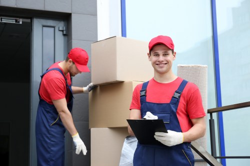 Local removals team handling furniture in Orpington