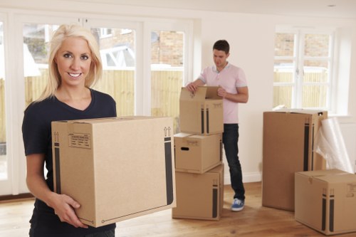 Local moving vehicle loading furniture near Orpington homes